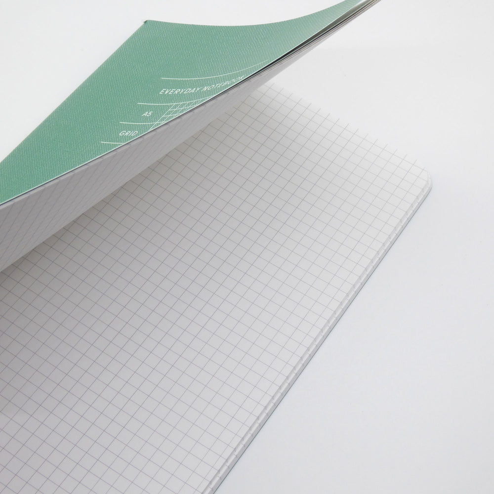 Inside of green Everyday Notebook, grid paper