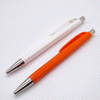 Caran d'Ache 888 Infinite Ballpoint Pens White and Orange