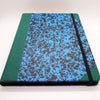 Blue patterned notebook with green trim and black elastic band - Emilio Braga