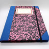 Pink patterned notebook with blue trim, black elastic and whit nameplate label. Emilio Braga Cloud Print A5 Notebook - Leaves Stationery Store