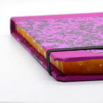 Corner of Emilio Braga Cloud Print A5 Notebook - Purple with orange page edges - Leaves Stationery Store