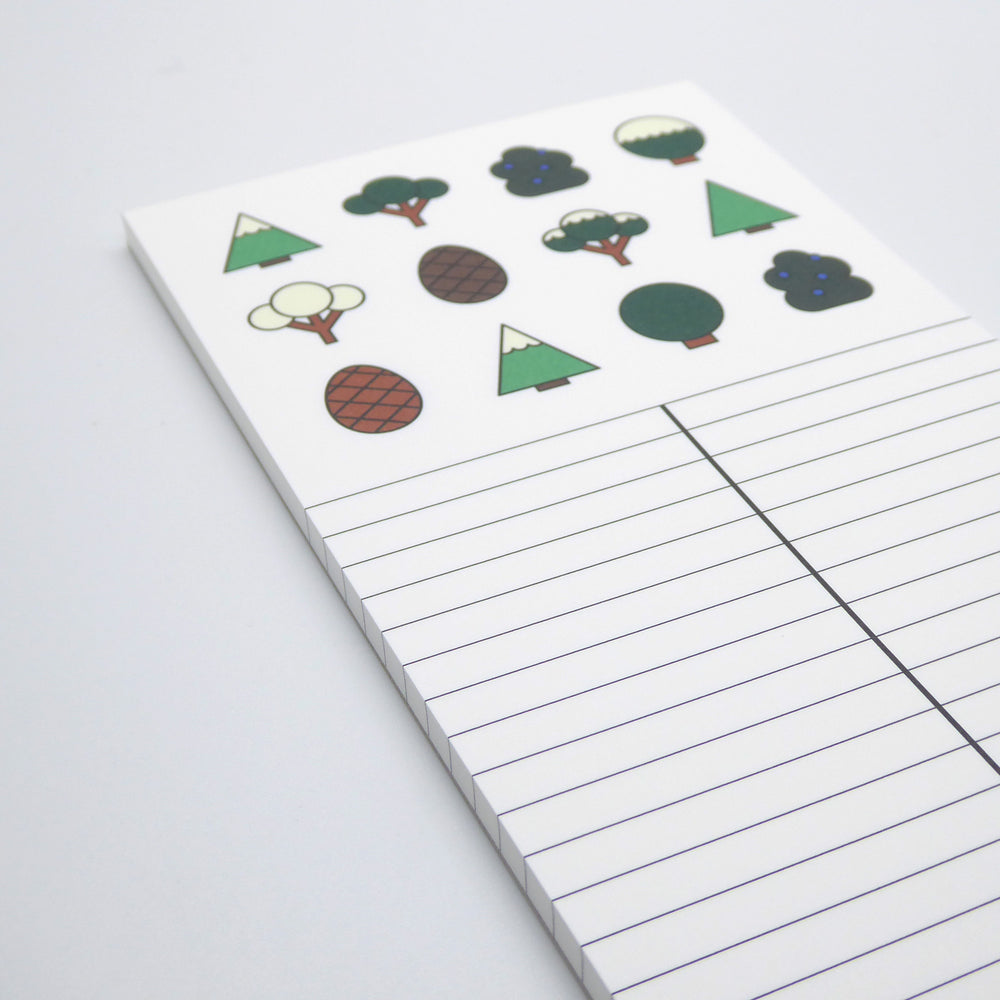 Detail image of Long Notepad with a variety of illustrated trees and pine cones at the top